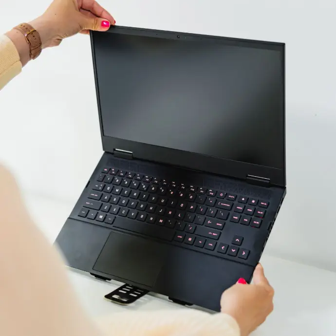 Check out laptop stands like the BakkerElkhuizen Universal BakkerElkhuizen Universal laptop stand attached to a laptop