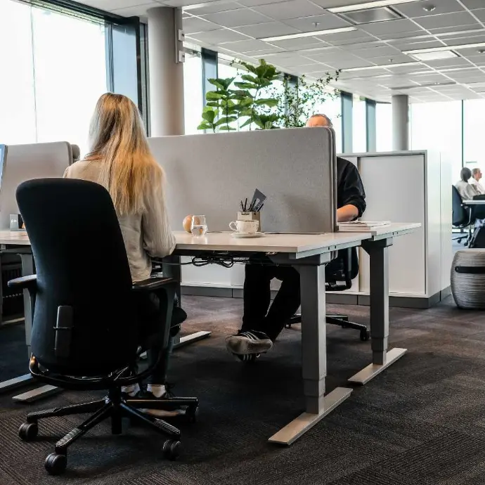 HÅG SoFi 7300 as an ergonomic office chair for offices, meeting rooms, and shared workspaces HÅG SoFi 7300 office chair in a modern office environment